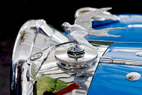 Bentley radiator filler cap with chrome plated flying bird sculpture