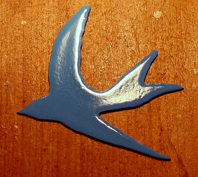 Blue bird vehicle badges for collectors and symbologists