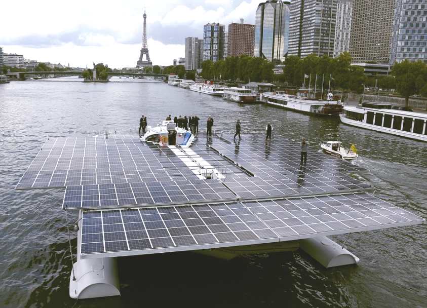 PlanetSolar approaching the Eiffel Tower in Paris