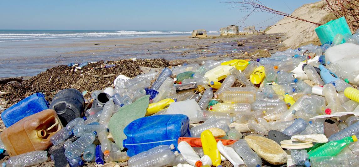 Plastic ocean pollution beach bottles