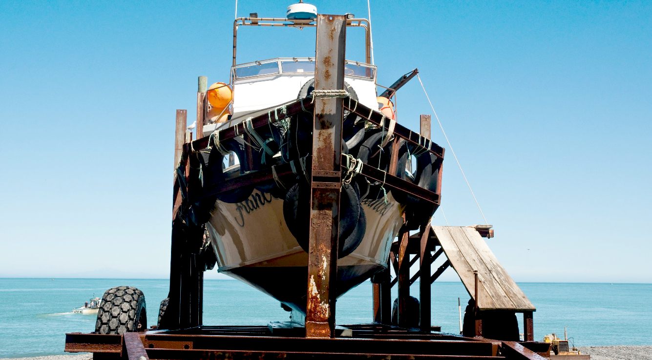 NGAWI BEACH LAUNCHED FISHING FLEET NEW ZEALAND BULLDOZERS