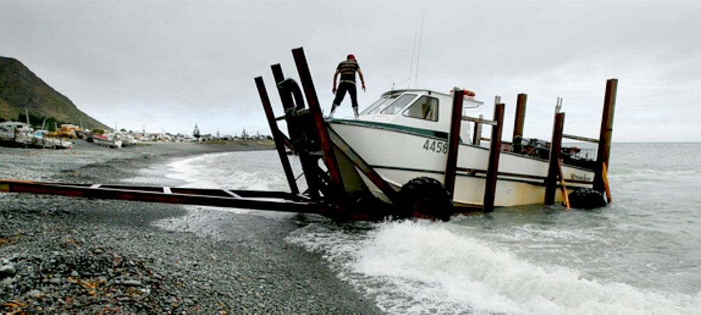 NGAWI BEACH LAUNCHED FISHING FLEET NEW ZEALAND BULLDOZERS