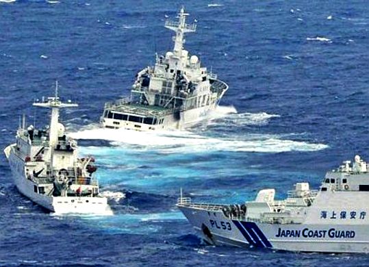 Japanese and Chinese coast guard boats touch base
